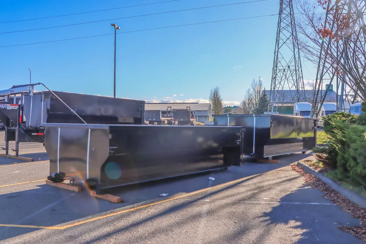 Roll-off dumpster ready for waste disposal at job site for 20 Yard Dumpster Rental in Bryan